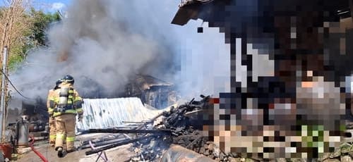 창원 귀산동 주택 화재, 인근 야산으로 번져…한때 '대응 1단계' 발령