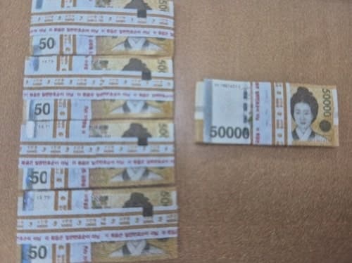 쓰레기봉투 속 현금 2500만 원, 6개월간 주인 안 나타나 최초 발견자 품으로